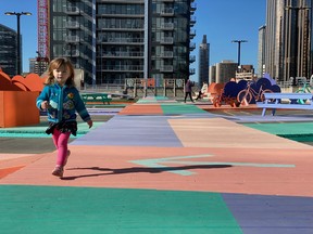 High Park downtown Calgary, with an outdoor stage, fire pits, seating, murals and activity stations. Photo courtesy Beltline Neighbourhoods Association.