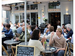 Take time out to watch the world go by from a cafe in Paris. The table is yours for as long as you want it. Courtesy, Marina Nelson