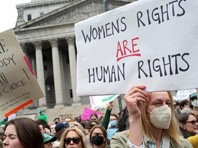 People protest after the leak of a draft majority opinion written by U.S. Supreme Court Justice Samuel Alito, preparing for a majority of the court to overturn the landmark Roe v. Wade abortion rights decision later this year, in New York City, U.S., May 3, 2022.