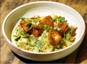 The Saffron Gnocchi, Fried Green Tomatoes, Sunflower and Arugula Pesto dish at Kama. Darren Makowichuk/Postmedia