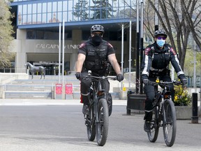 FILE PHOTO: Calgary police patrol Stephen Avenue mall in downtown Calgary on Monday, May 3, 2021. The Calgary police commission reported to council Tuesday that they will be looking to hire more officers to keep up with the demands of a growing city.