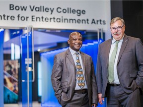 Boyden managing partner Kevin Gregor, at right, with Misheck Mwaba, president of Bow Valley College, one of the many organizations supported by the Calgary executive search firm.