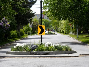 Roundabouts, such as these seen  on 14 Ave. N.W., are one example of an engineering solution the city is looking at to keep cars from seeding in residential areas.