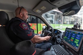 Cst. Brad Milne during a ride-along with Postmedia journalists in downtown on May 30.