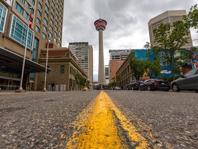 The Calgary Tower rises above Centre Street in downtown on Friday, June 24, 2022.