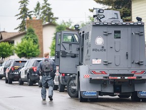 The Calgary police tactical unit is present at the scene of a fatal shooting on Falsby Way N.E. on Monday, July 4, 2022.