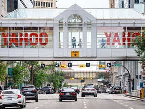 Pictured is a view of 9 Avenue SW in downtown Calgary with a Plus-15 adorned by two YAHOOs as Calgary prepares for the world's greatest outdoor extravaganza on Wednesday, July 6, 2022.
