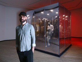 Chris Curreri poses in front of a large piece at Contemporary Calgary on Wednesday, June 22, 2022. The exhibition is called Chris Curreri: That, There, It. Jim Wells/Postmedia