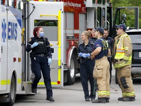 Calgary police investigate after a firefighter was hit by a fleeing vehicle as emergency services responded to a call in Calgary on Saturday, July 2, 2022.