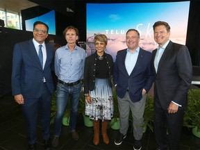 From left to right: Navin Arora, Executive Vice President of TELUS Business Solutions, Ian Gillespie, Founder and CEO of Westbank, Calgary Mayor Jyoti Gondek, Alberta Premier Jason Kenny and Darren Entwistle, President and CEO of TELUS pose at the opening of Telus Sky in downtown Calgary on Wednesday, July 6, 2022.