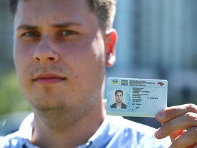 Albert Bronskyi, a recent arrival from Ukraine poses in East Village near downtown Calgary on Tuesday, July 12, 2022.