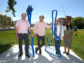 (L-R) Kyle Ripley, Calgary Parks Director, Coun. Gian-Carlo Carra, Margot Long and Tamara Marajh, Project Manager for Jack Long Park pose at the opening of Jack Long Park in Inglewood on Tuesday, July 19, 2022.