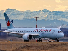 FILE PHOTO: An Air Canada Boeing 787 lines up for takeoff en route to Toronto from Calgary International Airport Thursday, Nov. 18, 2021.