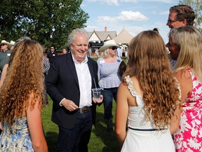 Conservative leadership contestant Jean Charest meets supporters at the conservative BBQ during the Calgary Stampede in Calgary, Alberta, Canada on July 9, 2022.