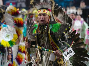 Competitors take part in the 2022 Calgary Stampede Powwow, featuring competitive dancing, drumming, singing and a showcase of other Indigenous performances. Tuesday, July 12, 2022.