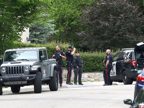 Calgary police investigate after the discovery of a body in an alley in Upper Mount Royal on Sunday, July 3, 2022.