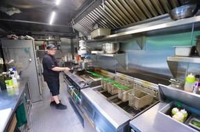 The Artist Lounge head chef Trent Bochek in the kitchen which is inside a metal shipping container out back.Gavin Young/Postmedia