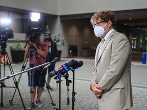 Calgary City Councillor Gian-Carlo Carra answers media questions outside council chambers on Tuesday, July 26, 2022.
Gavin Young/Postmedia