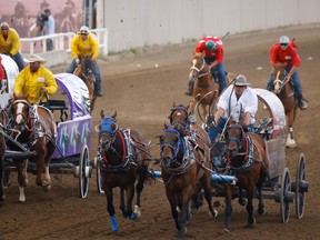 Darcy Flad came off the '1' barrel in Heat 2 to finish first in the Cowboys Rangeland Derby at the Calgary Stampede on Saturday.