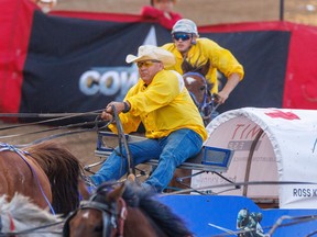 Cowboys Rangeland Derby driver Ross Knight comes off the 3 barrel in Heat 5 of the Rangeland Derby at the Calgary Stampede on Friday July 8, 2022. Mike Drew/Postmedia