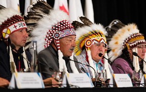 Left to right: Alexis Nakota Sioux Nation Chief Tony Alexis, Grand Chief George Arcand Jr. of the Confederacy of Treaty Six First Nations and Chief of Alexander First Nation, Ermineskin Cree Nation Chief Randy Ermineskin and Louis Bull Chief Desmond Bull speak at a press conference with First Nations Chiefs and residential school survivors ahead of Pope Francis’ visit in Edmonton, on Thursday.
