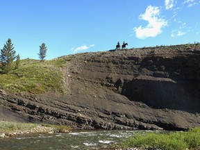 Ranchers on a ridge above the Livingstone River where it flows near Cabin Ridge, the site of a proposed coal mine north of Coleman.