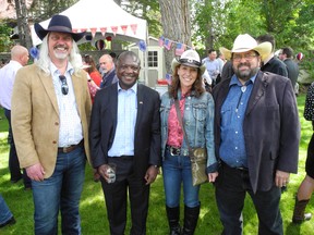 From left: Scott McTavish;  Bow Valley College President and CEO Misheck Mwaba;  marla tuw;  and AU Arts President and CEO Daniel Doz.
