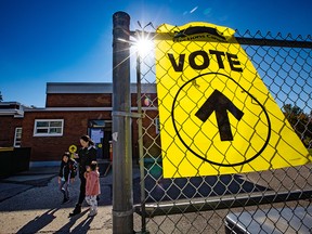 FILE PHOTO: Calgarians vote at Sunnyside School in the 2021 federal election on Monday, September 20, 2021.