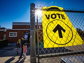 FILE PHOTO: Calgarians vote at Sunnyside School in the 2021 federal election on Monday, Sept. 20, 2021.