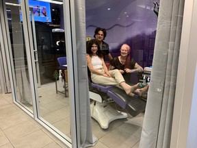 Angles Brentwood owners Frank and Donna Rizzuto with tattoo artist Cherie Johnson in their new studio built inside the hair salon.