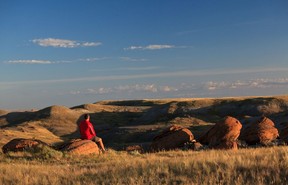 The author enjoying the view at Red Rock Coulee near Seven Persons, Alberta.Courtesy, Andrew Penner