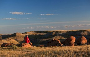 The author enjoys the view at Red Rock Coulee near Seven Persons, Alberta.  Courtesy of Andrew Penner