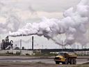 A dump truck works near the Syncrude tar sands extraction facility near the town of Fort McMurray, Alberta.  The oil and gas industry learned Monday of the regulatory options Canada is considering to reduce carbon emissions.