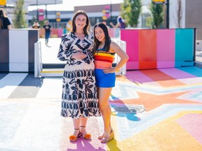 Pictured at the VIP launch of #YYCBlockParty at Deerfoot City June 30 are event producers PARK president Kara Chomistek, left, and vice-president Jessie Landry. The innovative installation features an outdoor roller skating rink, a hand-painted road mural, over-sized sculptures and art-adorned seating created by Canadian artists. Courtesy, Kelly Hofer