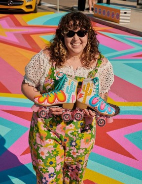 Artist Sarah Lamoureux shows off her hand-painted roller skates. Courtesy, Brendan Klem