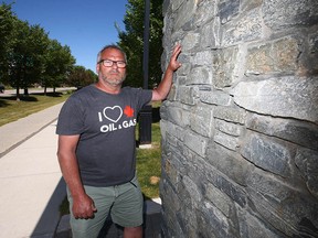 Garry Moyes at the site in Currie Barracks where plaques honoring Victoria Cross recipients were stolen.