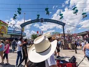 It's a busy day at Stampede Park on the first day of the Calgary Stampede on Friday, July 8, 2022.