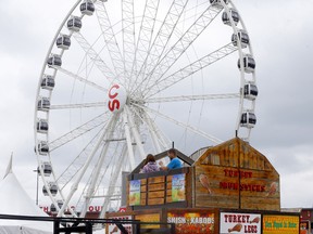 The super wheel gets some finishing touches at Stampede Park as the world's greatest show approaches in Calgary on Sunday, July 3, 2022.