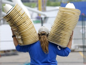 Holly Middel, Supervisor at Lammle's sets up her shop at Stampede Park in Calgary on Sunday, July 3, 2022.