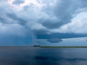 FILE PHOTO — A storm rolls by Midway, east of Carstairs, on June 7, 2016.