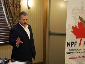 FILE PHOTO: Kevin Halwa, National Police Federation (NPF) Regional Director, addresses community members at Stony Plain Inn & Suites on Friday, Jan. 7, 2022.