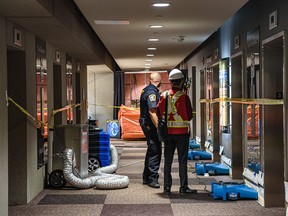 Repairs continued Thursday, August 4, 2022, at the Calgary municipal building after a man broke in and started several fires, triggering the sprinkler system.
