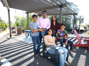 Parents Shafiqa Abubacker and her husband Faizul Mohamed with their children Haaris Mohamed, 9, Zaahir Mohamed, 11, and their cousin Shifa Mohideen. They love their new house by Calbridge Homes in Alpine Park. The community offers beautiful open parks and pathways.