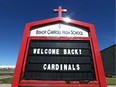 A sign in front of Bishop Carroll High School in Calgary is pictured on Tuesday, August 30, 2022.
