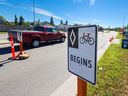 The test bike lanes along 18th Street SE in Quarry Park were taken down on Tuesday, August 30, 2022. 