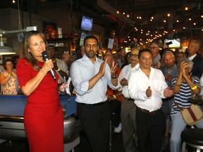 Chrystia Freeland with George Chahal at the Garage to meet supporters in Calgary on Tuesday, August 30, 2022.