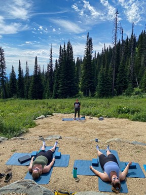 Image of yoga in the mountains at Sun Peaks Resort near Kamloops, British Columbia, Canada.