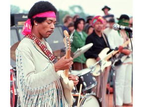 Jimi Hendrix was one of the most anticipated acts at Woodstock, but delays over the weekend meant he would close the festival at 9am.  on Monday instead of performing on Sunday night.  While many in the crowd had left by then, Hendrix's performance became a memorable highlight of Woodstock, especially when he gave a heavily reworked performance of Star Spangled Banner.  Photo by Henry Diltz/AFP/Getty Images.