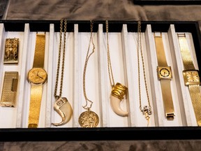 A collection of personal jewelry belonging to Elvis Presley and Colonel Tom Parker, which has been lost for decades and will be sold at auction in August. REUTERS/Aude Guerrucci