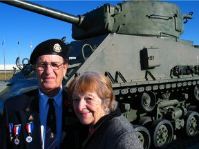 Calgary, November 8, 2005: Elly and Marjorie Raskin in front of the Sherman tank at the Calgary Regimental Museum. He was a prairie boy in a King's Own Calgary Tanks uniform, she was a London girl, when they met at a ball. (David Bly, Calgary Herald, for the history of the city by David Bly) PUBLICATION DATE: NOVEMBER 11, 2005 *CALGARY HERALD MERLIN ARCHIVE*